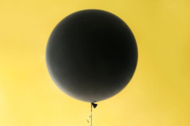 black-balloon-on-yellow.jpg