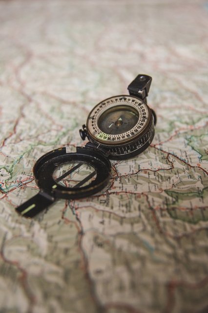 open-compass-on-world-map.jpg