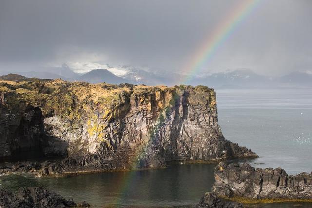 rainbow-and-rock-cliff.jpg