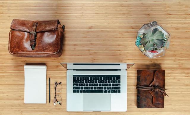 workspace-flatlay-with-leather-bag-and-notebook.jpg