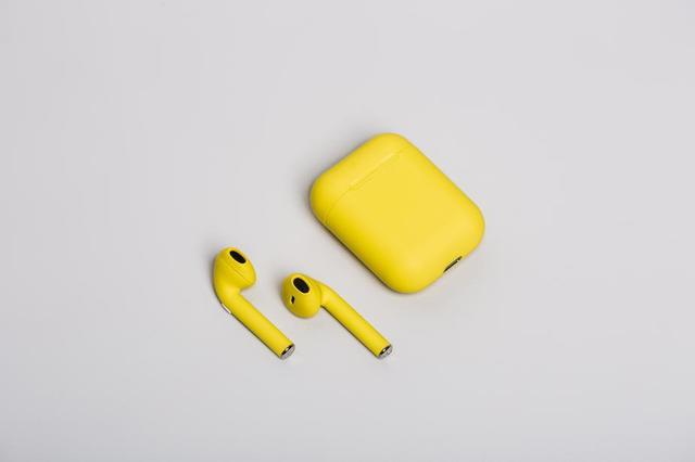 yellow-earbuds-on-white.jpg